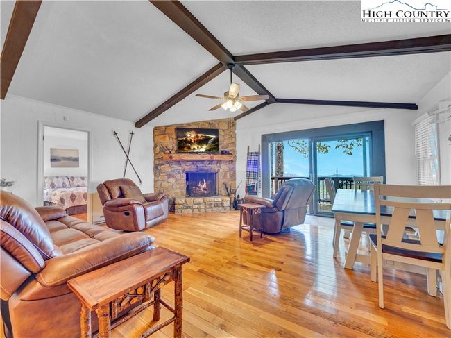 Wood floors & wood burning fireplace | Image 8