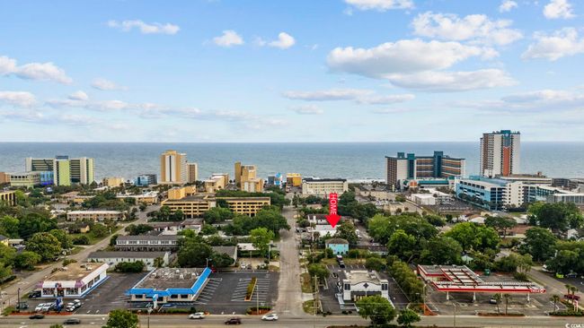 View of urban area with a nearby body of water | Image 21