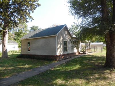 View of side of home featuring a lawn | Image 3