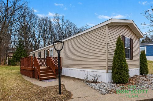 6913 Sandwood Dr Ne, Rockford, MI, 49341-9202 | Card Image