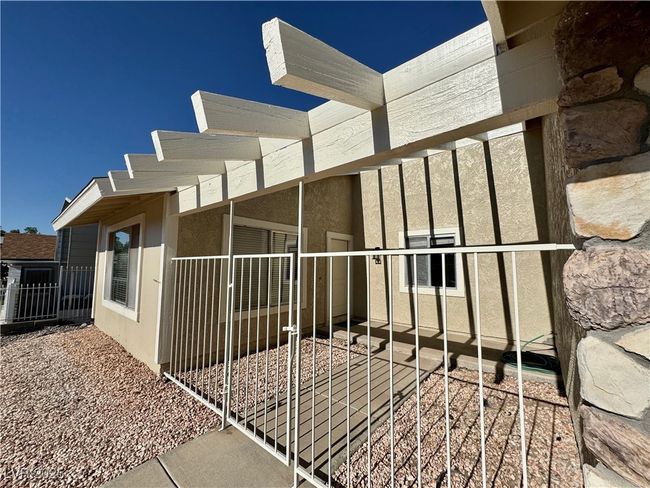 View of side of home with stucco siding | Image 6
