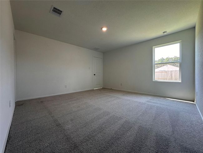 Spacious primary bedroom | Image 7