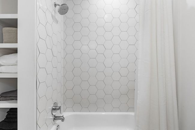 Hall full bathroom with tub and storage! | Image 25