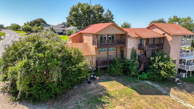 Back of house featuring a balcony | Image 33
