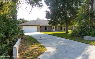 5735 Palm Street, House other with 4 bedrooms, 2 bathrooms and null parking in Mims FL | Image 2