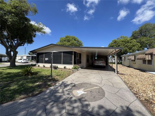 6733 Kensington Dr Ne, WINTER HAVEN, FL, 33881-9674 | Card Image