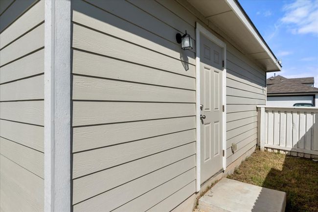Doorway to property with fence | Image 33