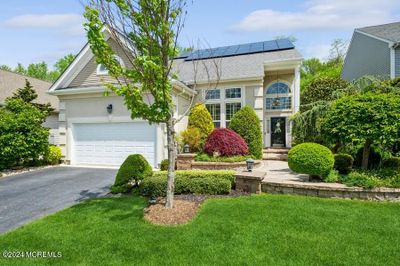 77 Wintergreen Drive, Home with 4 bedrooms, 3 bathrooms and null parking in Manalapan NJ | Image 1