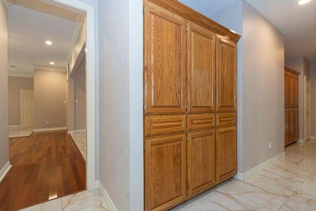 Hallway looking towards the living room/entry. | Image 25