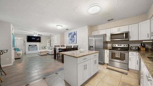 11428 Rustic Pines Cir E, House other with 4 bedrooms, 3 bathrooms and null parking in JACKSONVILLE FL | Image 7