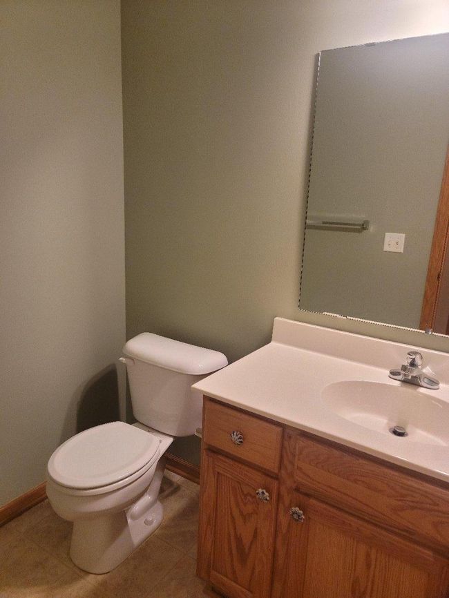 Main floor half bathroom | Image 15