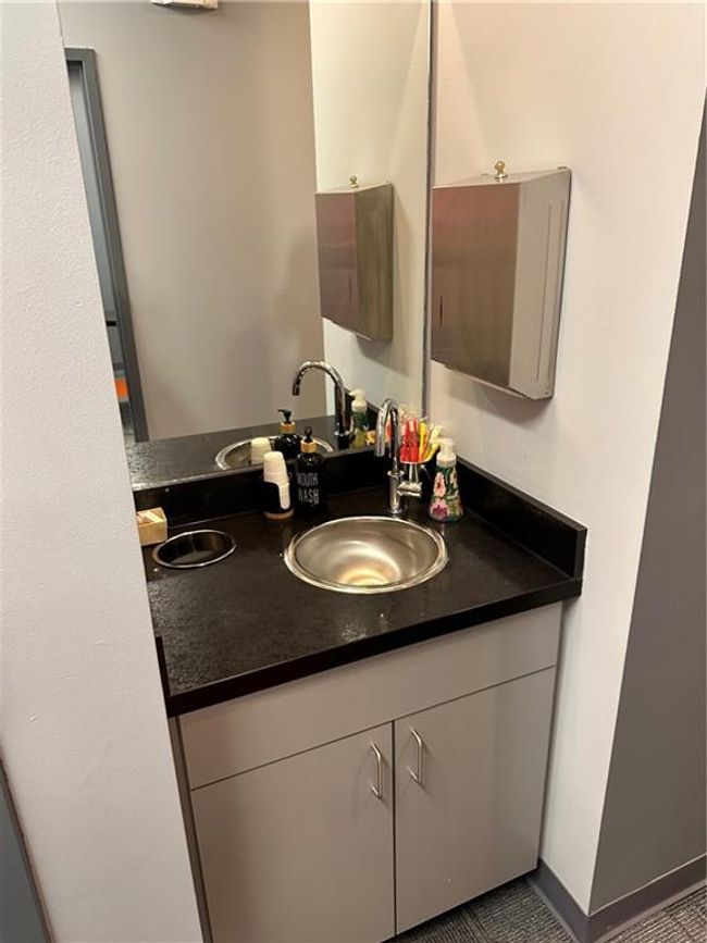 Bathroom featuring vanity | Image 6