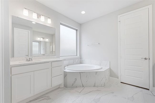 Soaking tub, never used, per sellers. Double sinks, vanities. The perfect relaxation retreat. | Image 14