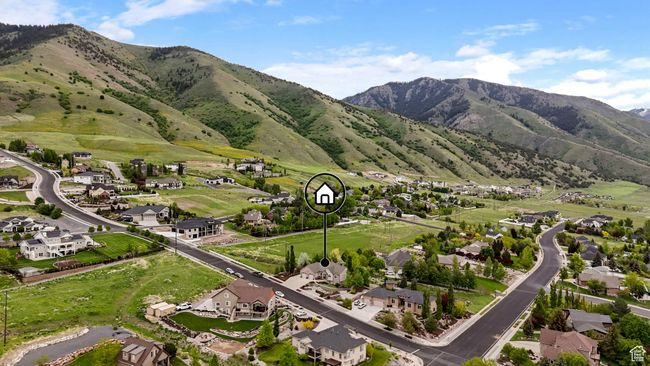 View of mountain backdrop featuring nearby suburban area | Image 6