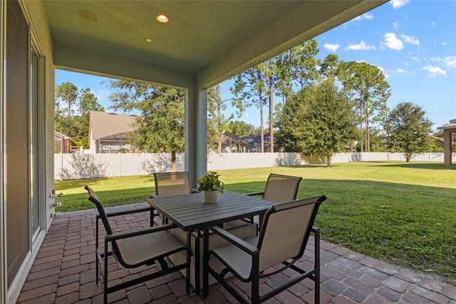 Back covered patio plumbed and wired for outdoor kitchen | Image 41