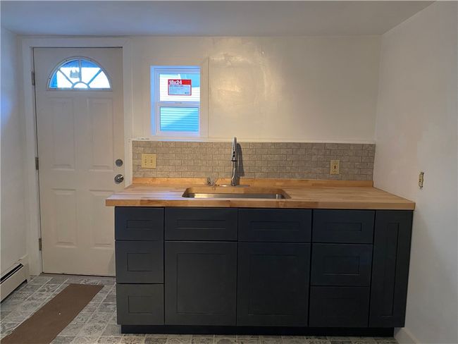 Additional counter space next to the sink | Image 13