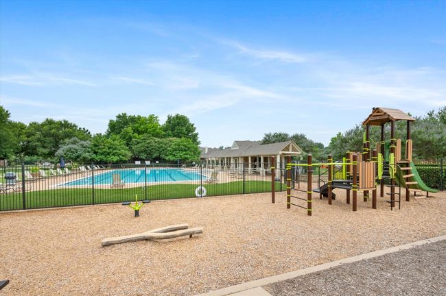 Communal playground with a community pool | Image 38