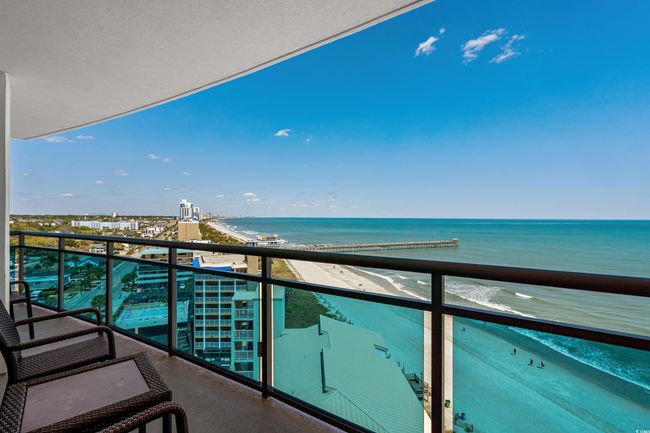 Balcony with a water view and a city view | Image 30