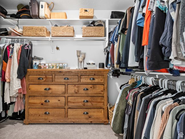 Walk in closet featuring carpet floors | Image 21
