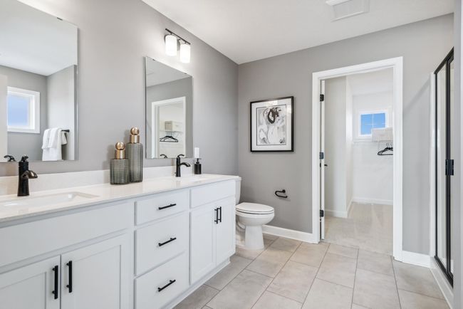 (Photo of a decorated model home, actual features may vary) The owner's bath is a perfect place to rejuvenate! | Image 19