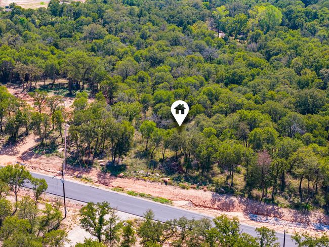Aerial view of a heavily wooded area | Image 18