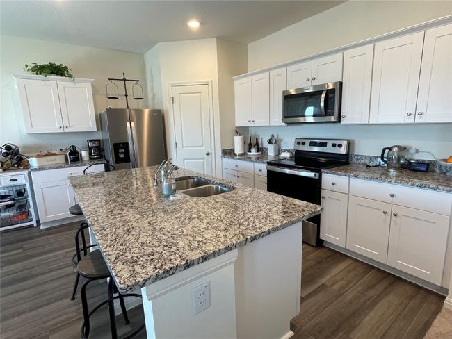 Downstairs there is a full bathroom & bedroom. Ideal for longer staying guests. | Image 16