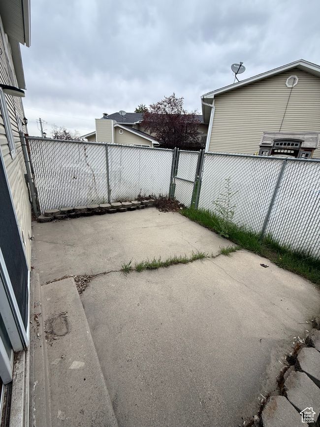 View of patio / terrace with fence and a gate | Image 17