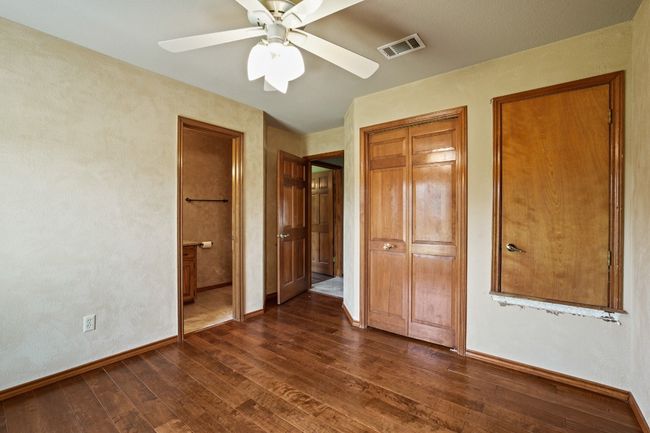 Secondary bedroom with private full bath with walk-in shower | Image 21