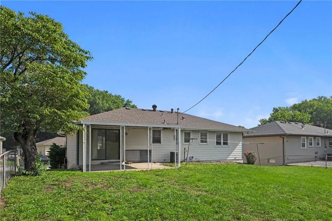 Rear view of property featuring a sunroom | Image 28