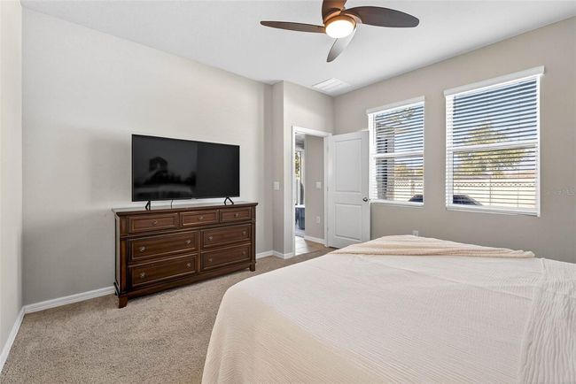Primary suite has view of the back yard. | Image 18