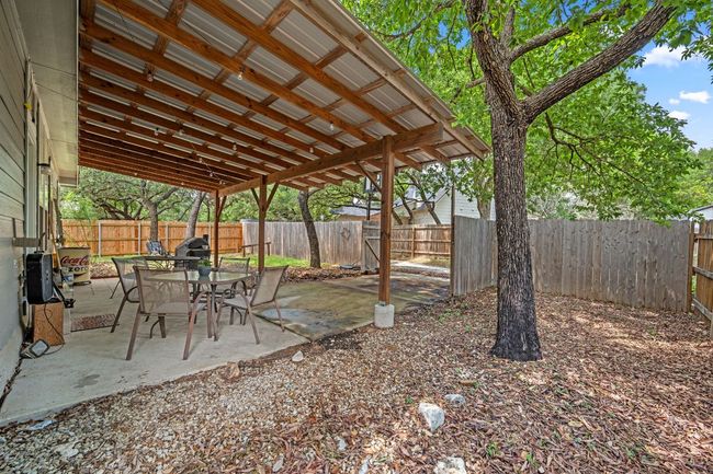 Fenced backyard featuring a​​‌​​​​‌​​‌‌​‌‌​​​‌‌​​‌‌​‌​​​​​‌ patio | Image 29