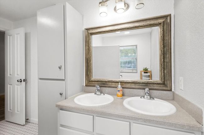 Full bath featuring double vanity | Image 10
