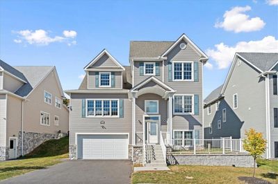 View of front of property featuring a garage | Image 1