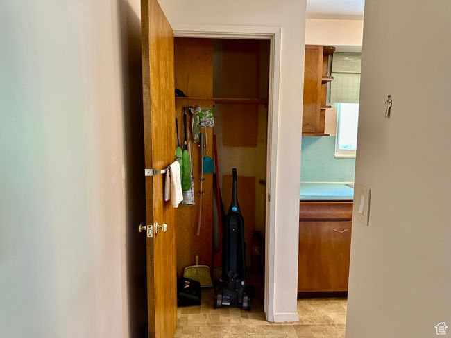 View of kitchen broom closet | Image 27