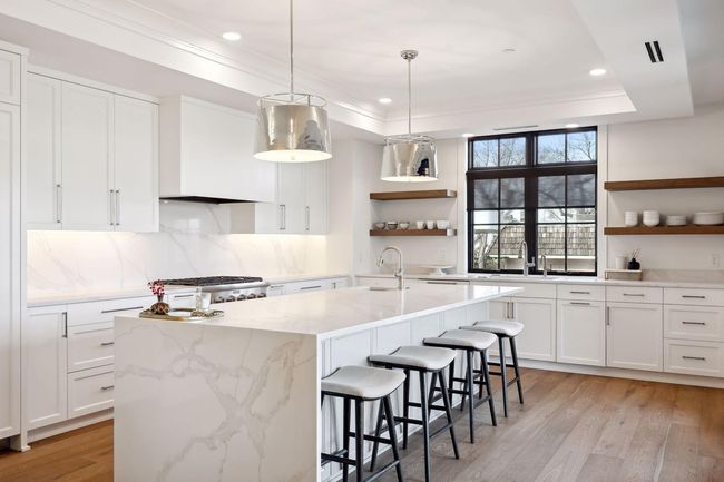 On trend waterfall design featured on the large center island | Image 11