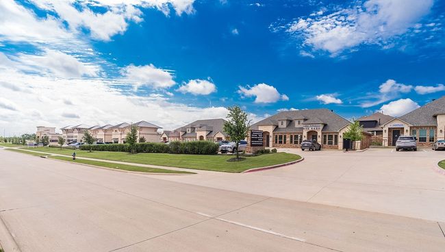 View of concrete road with a residential view, curbs, and sidewalks | Image 23
