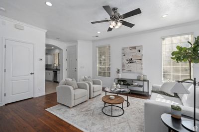 Living room with ornamental molding, ceiling fan, and tile flooring | Image 2