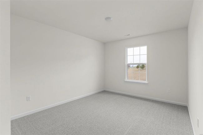 View of carpeted spare room | Image 11