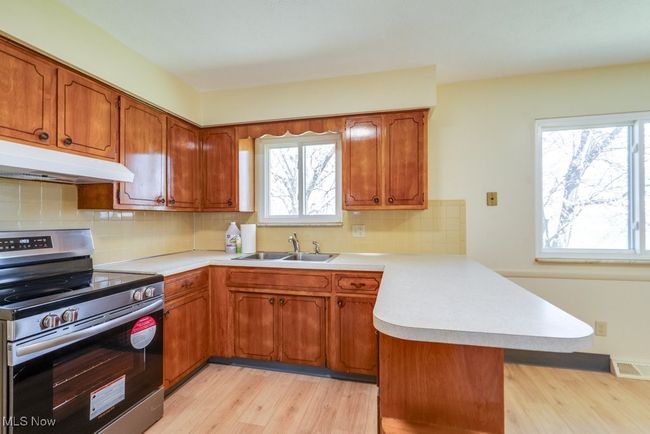1795 Hudacsek Dr, Home with 4 bedrooms, 2 bathrooms and null parking in Mogadore OH | Image 5