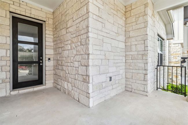 Entrance to property with stone siding | Image 4