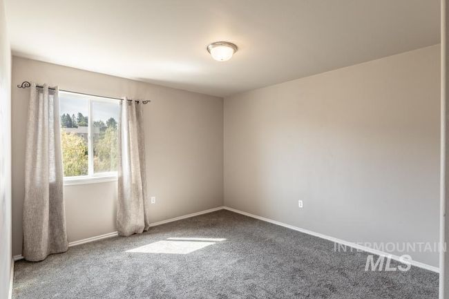 Unfurnished room featuring carpet floors and baseboards | Image 19