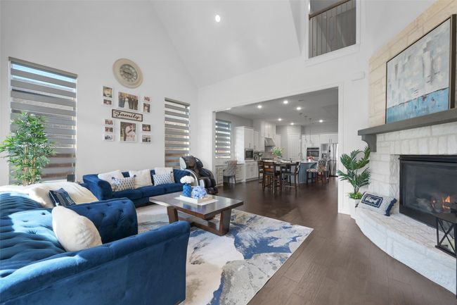 Living area featuring open concept flowing to the breakfast nook to the Kitchen. | Image 15