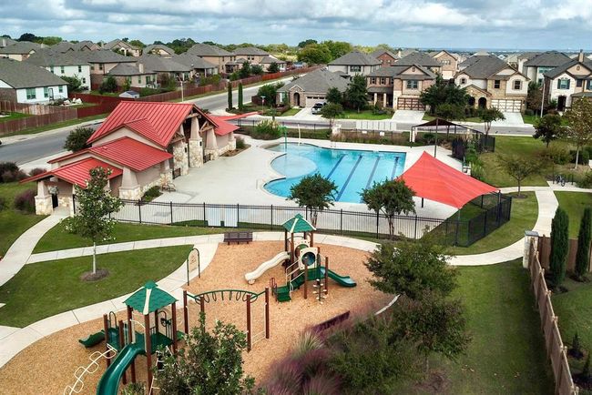 Community pool with fence, playground community, and a residential view | Image 32