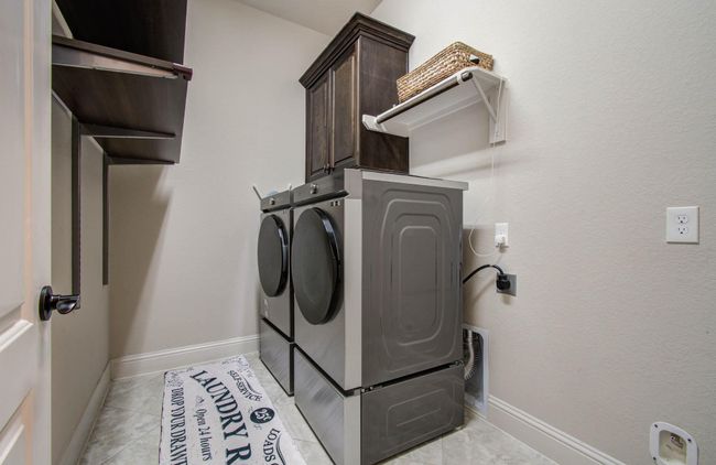 Large laundry with shelving system | Image 22