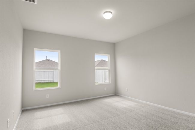 Carpeted empty room with baseboards and a healthy amount of sunlight | Image 16