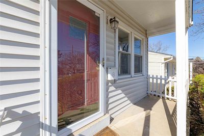 View of exterior entry featuring a porch | Image 3