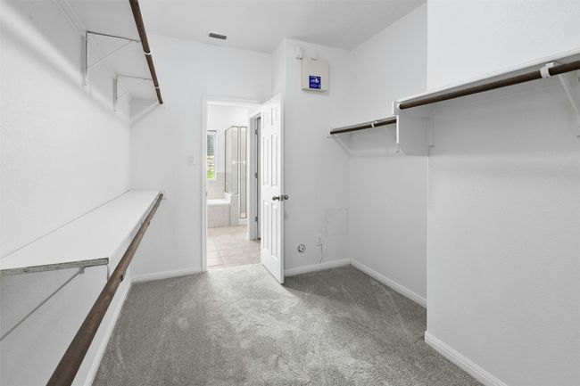 A generously sized closet gives you plenty of space for your wardrobe. | Image 12