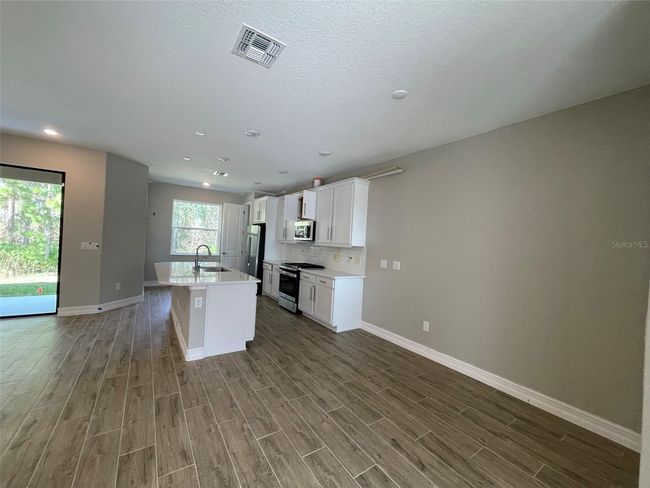 5062 San Martino Drive, Townhouse with 3 bedrooms, 2 bathrooms and null parking in Wesley Chapel FL | Image 2