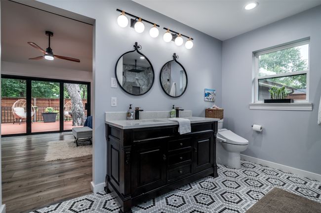 Full bathroom with vanity, ceiling fan, healthy amount of natural light, recessed lighting, and wood finished floors | Image 21