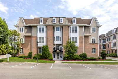 1 - 408 Pacing Way, Condo with 2 bedrooms, 2 bathrooms and 1 parking in Westbury NY | Image 1